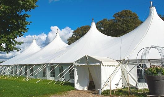 a line of sleek and modern portable toilets ready for use at an upscale corporate event in Belchertown MA